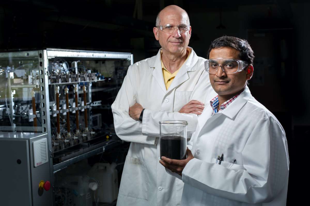 Robert Brown and Santanu Bakshi in a lab
